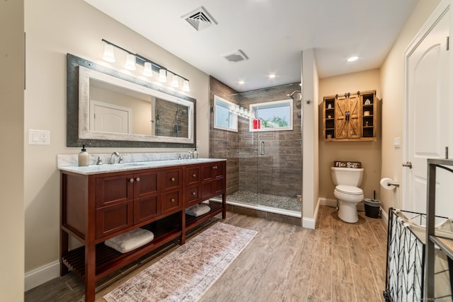 732 Hulls Hill Rd, Southbury, CT 06488 - full bath with double vanity, a shower stall, baseboards, toilet, and recessed lighting