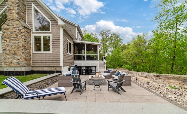 732 Hulls Hill Rd, Southbury, CT 06488 - view of patio featuring a sunroom and a fire pit