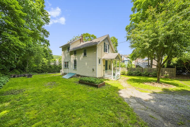 245 Riverside Ave, Torrington, CT 06790 - back of property featuring a chimney