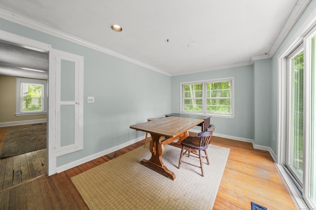 245 Riverside Ave, Torrington, CT 06790 - dining room featuring healthy amount of natural light, light wood-style flooring, baseboards, and crown molding