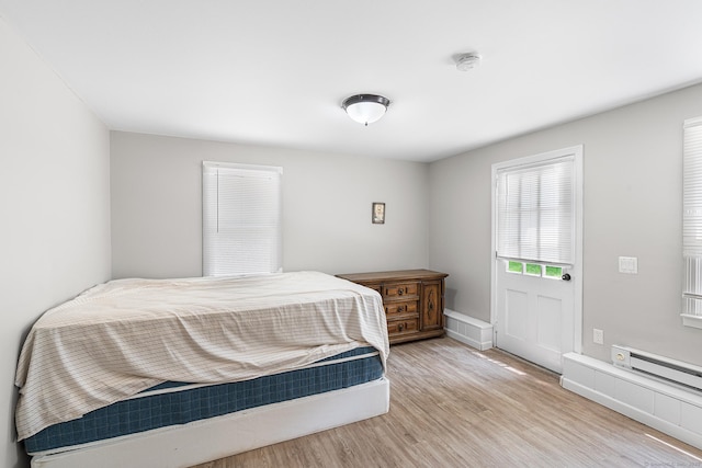 33 Deer Park Rd, Simsbury, CT 06089 - bedroom with light wood-style floors and baseboards