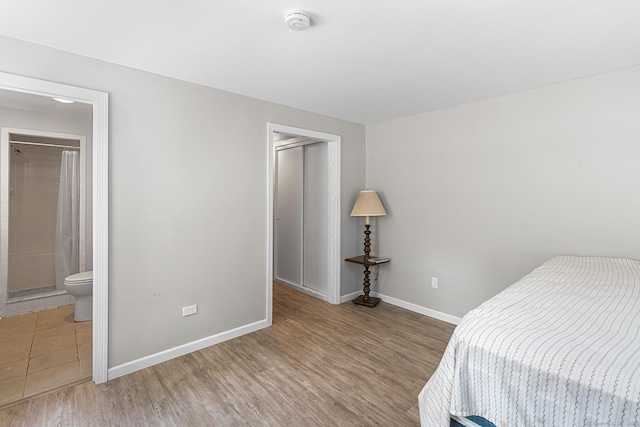 33 Deer Park Rd, Simsbury, CT 06089 - bedroom with wood finished floors and baseboards