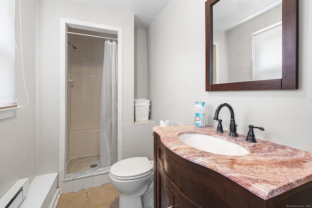 33 Deer Park Rd, Simsbury, CT 06089 - bathroom with toilet, tiled shower, baseboard heating, vanity, and tile patterned floors
