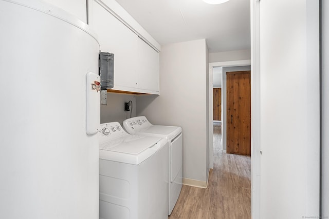 33 Deer Park Rd, Simsbury, CT 06089 - laundry area featuring washer and dryer, light wood-style floors, cabinet space, and baseboards
