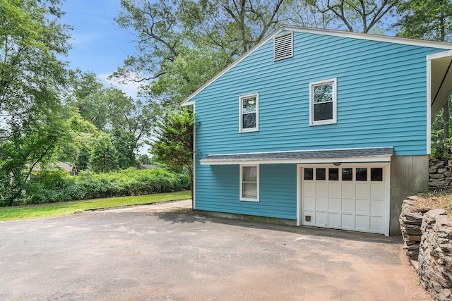 33 Deer Park Rd, Simsbury, CT 06089 - view of side of home with asphalt driveway