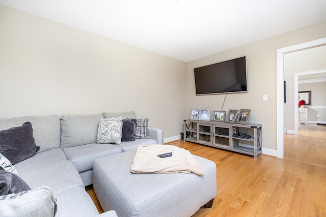 1382 Cedar Swamp Rd, Coventry, CT 06238 - living area featuring light wood-style floors and baseboards