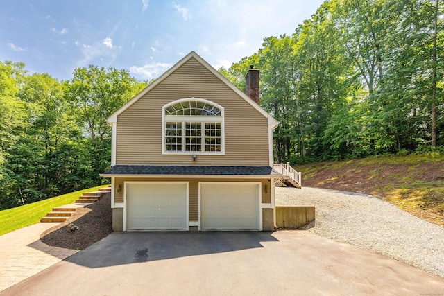 1382 Cedar Swamp Rd, Coventry, CT 06238 - garage with asphalt driveway