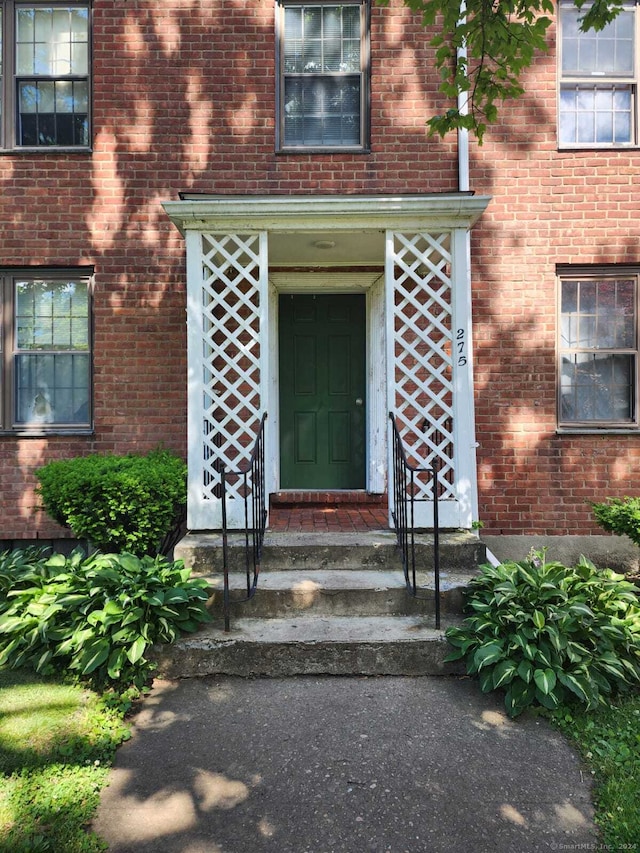 275 Texas Ave Unit D, Bridgeport, CT 06610 - doorway to property with brick siding