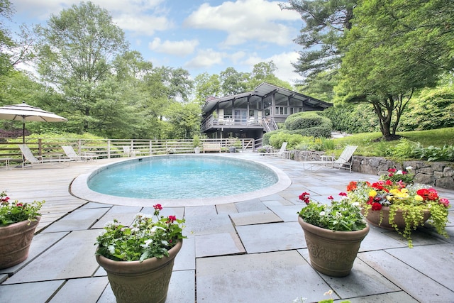 62 Wells Hill Rd, Weston, CT 06883 - view of swimming pool featuring a deck and a sunroom