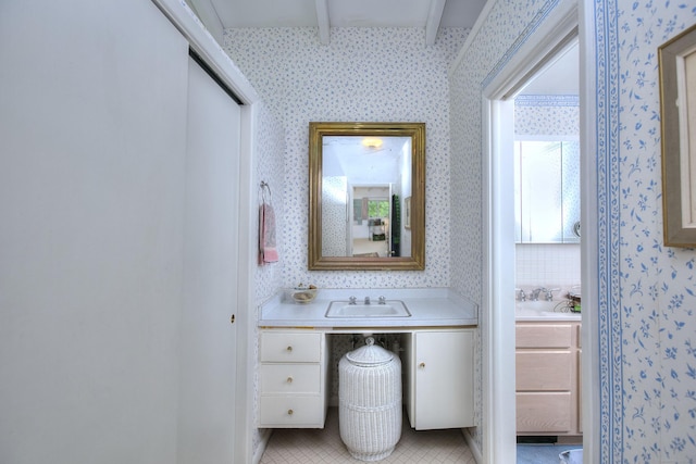 62 Wells Hill Rd, Weston, CT 06883 - bathroom with wallpapered walls and vanity
