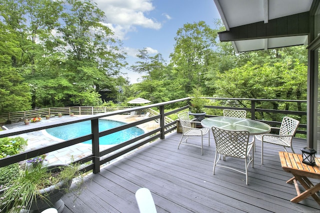 62 Wells Hill Rd, Weston, CT 06883 - wooden deck featuring outdoor dining area and view of wooded area