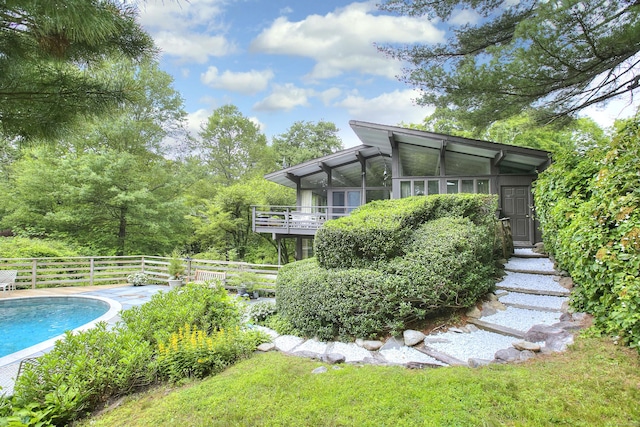 62 Wells Hill Rd, Weston, CT 06883 - rear view of house featuring a sunroom
