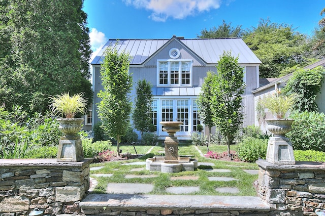 2683 Bronson Rd, Fairfield, CT 06824 - view of front facade featuring a standing seam roof and a metal roof