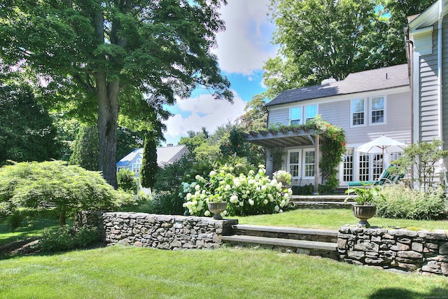2683 Bronson Rd, Fairfield, CT 06824 - view of green lawn with a pergola