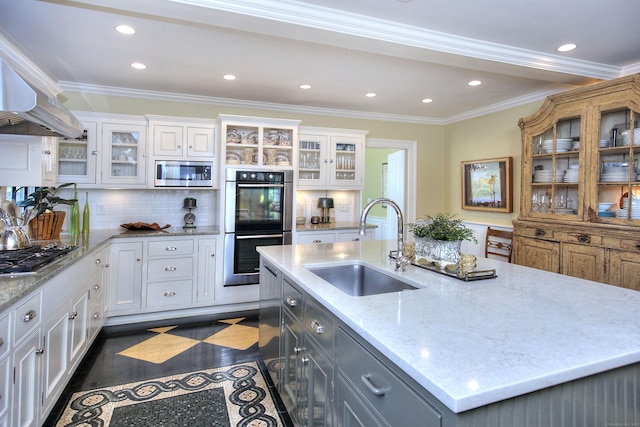 2683 Bronson Rd, Fairfield, CT 06824 - kitchen featuring stainless steel appliances, white cabinetry, recessed lighting, wall chimney exhaust hood, and crown molding