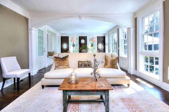 2683 Bronson Rd, Fairfield, CT 06824 - living room featuring arched walkways, wood finished floors, french doors, and ornamental molding