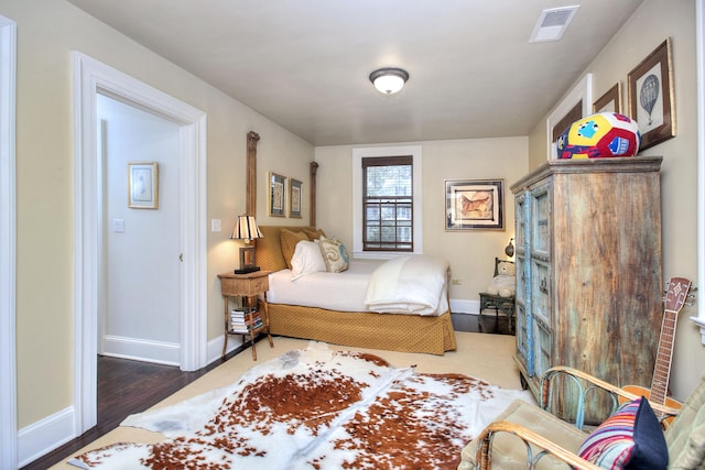 2683 Bronson Rd, Fairfield, CT 06824 - bedroom featuring baseboards and wood finished floors