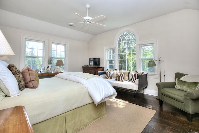 2683 Bronson Rd, Fairfield, CT 06824 - bedroom featuring multiple windows, dark wood-type flooring, vaulted ceiling, and ceiling fan