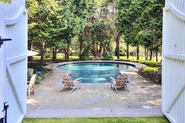 2683 Bronson Rd, Fairfield, CT 06824 - swimming pool with a patio area