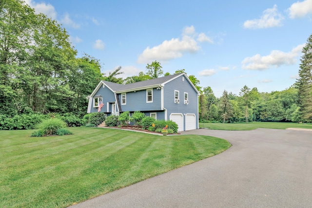 175 Cross Hill Rd, Monroe, CT 06468 - raised ranch with a garage, driveway, and a front yard