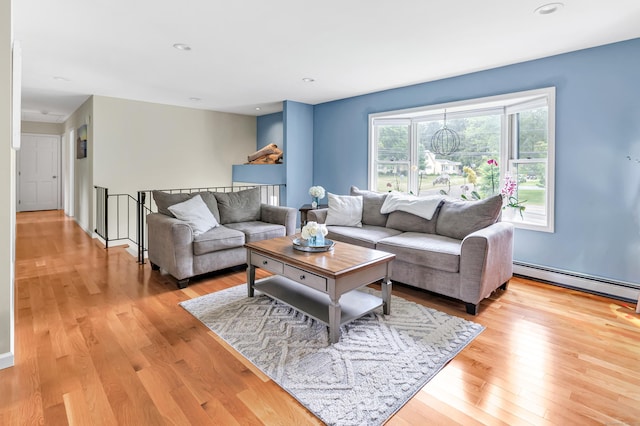 175 Cross Hill Rd, Monroe, CT 06468 - living area with light wood finished floors and baseboard heating