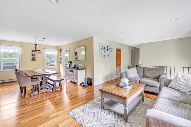 175 Cross Hill Rd, Monroe, CT 06468 - living room with baseboard heating, light wood-style flooring, and recessed lighting