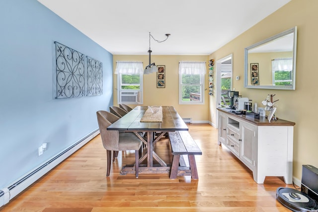 175 Cross Hill Rd, Monroe, CT 06468 - dining area featuring a baseboard heating unit, light wood finished floors, baseboards, a baseboard radiator, and cooling unit