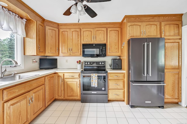 175 Cross Hill Rd, Monroe, CT 06468 - kitchen featuring stainless steel appliances, a sink, a ceiling fan, light countertops, and light tile patterned floors