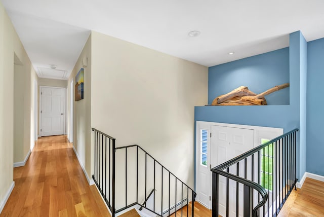 175 Cross Hill Rd, Monroe, CT 06468 - hall featuring an upstairs landing, light wood-style floors, attic access, and baseboards