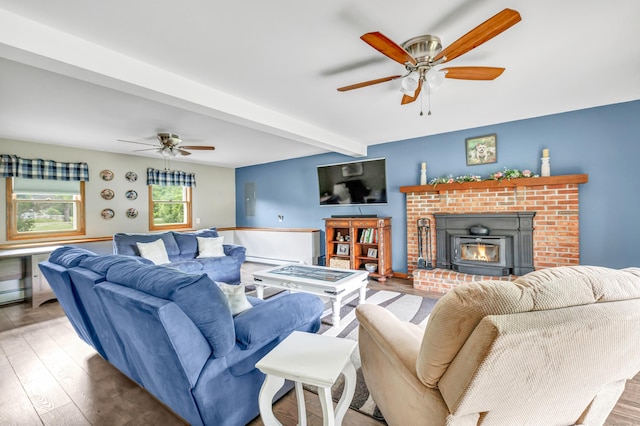 175 Cross Hill Rd, Monroe, CT 06468 - living area with a ceiling fan, wood finished floors, beamed ceiling, a fireplace, and baseboard heating