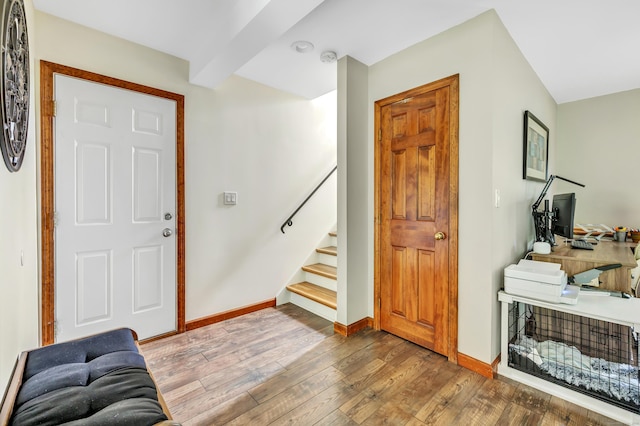 175 Cross Hill Rd, Monroe, CT 06468 - entrance foyer featuring wood-type flooring, stairs, and baseboards