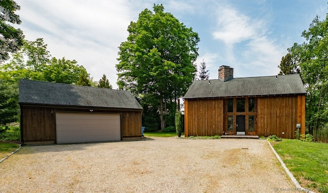 94 Boston Post Rd, Madison, CT 06443 - garage with gravel driveway