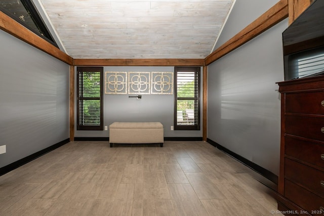 94 Boston Post Rd, Madison, CT 06443 - empty room with vaulted ceiling, healthy amount of natural light, wood finished floors, wood ceiling, and baseboards