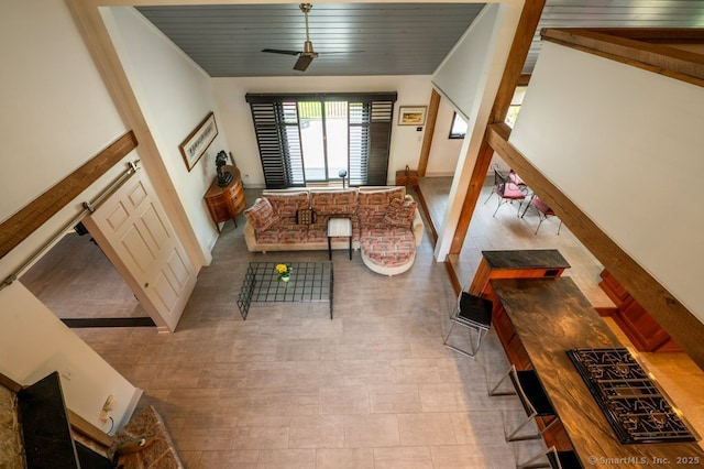 94 Boston Post Rd, Madison, CT 06443 - living area featuring ceiling fan, tile patterned floors, and wooden ceiling