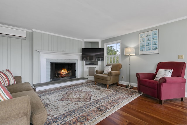 290 Neck Rd, Madison, CT 06443 - living room featuring wood finished floors, a brick fireplace, ornamental molding, baseboards, and a wall mounted AC