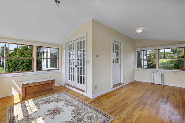 290 Neck Rd, Madison, CT 06443 - unfurnished sunroom with radiator, lofted ceiling, french doors, and healthy amount of natural light
