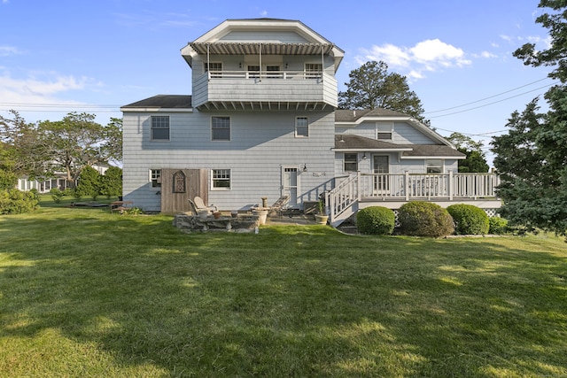 290 Neck Rd, Madison, CT 06443 - rear view of property with an outdoor fire pit, a balcony, and a lawn