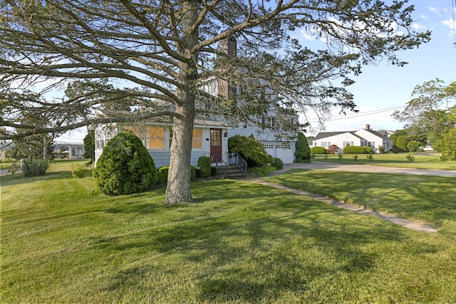 290 Neck Rd, Madison, CT 06443 - obstructed view of property with a garage, a front lawn, a chimney, and driveway