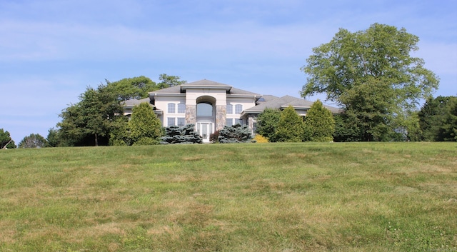 11 Pheasant Ridge Rd, Newtown, CT 06470 - view of front of house featuring stone siding and a front lawn