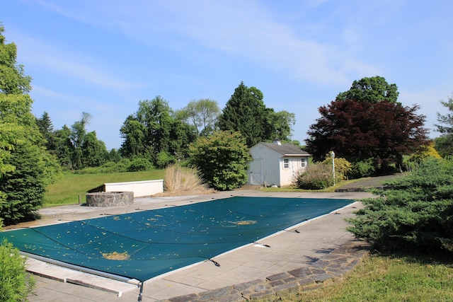 11 Pheasant Ridge Rd, Newtown, CT 06470 - view of pool with a storage shed, a covered pool, and a patio area