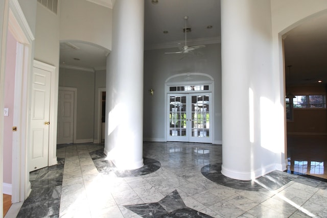 11 Pheasant Ridge Rd, Newtown, CT 06470 - corridor featuring a towering ceiling, marble tiled floors, ornamental molding, arched walkways, and decorative columns