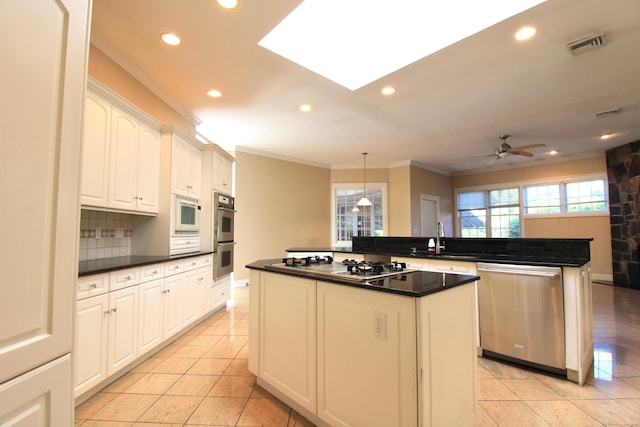 11 Pheasant Ridge Rd, Newtown, CT 06470 - kitchen featuring appliances with stainless steel finishes, a kitchen island, dark countertops, recessed lighting, and backsplash
