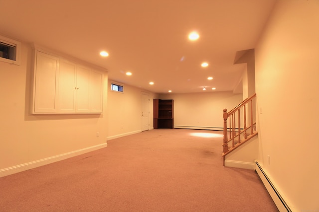 11 Pheasant Ridge Rd, Newtown, CT 06470 - spare room with a baseboard radiator, recessed lighting, light carpet, and stairs