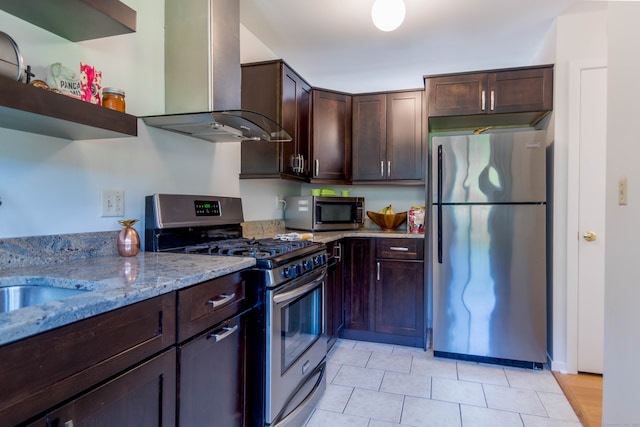 30 Montoya Dr Unit 30, Branford, CT 06405 - kitchen with appliances with stainless steel finishes, wall chimney exhaust hood, dark brown cabinets, light stone counters, and open shelves