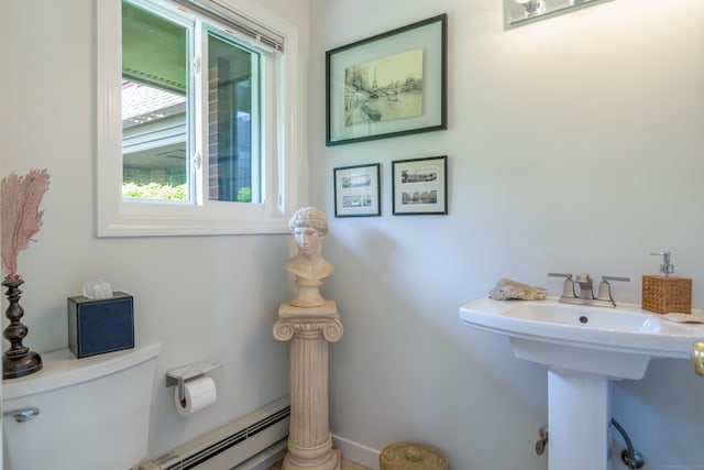 30 Montoya Dr Unit 30, Branford, CT 06405 - bathroom featuring toilet, a sink, and a baseboard radiator