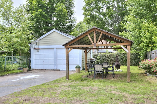 100 Union Ave, West Haven, CT 06516 - view of yard featuring a detached garage, an outbuilding, and a gazebo