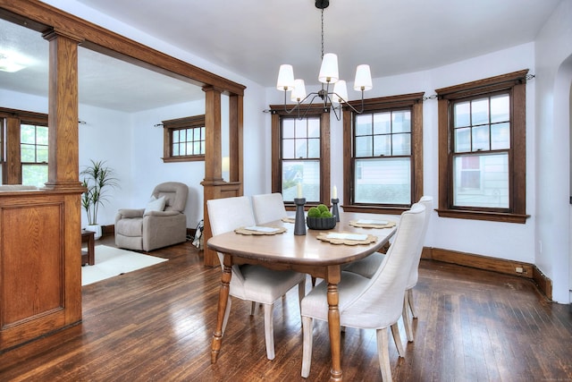 100 Union Ave, West Haven, CT 06516 - dining room featuring a chandelier, dark wood-style floors, and baseboards
