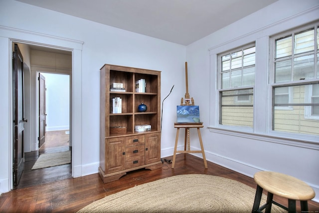 100 Union Ave, West Haven, CT 06516 - sitting room with dark wood finished floors and baseboards