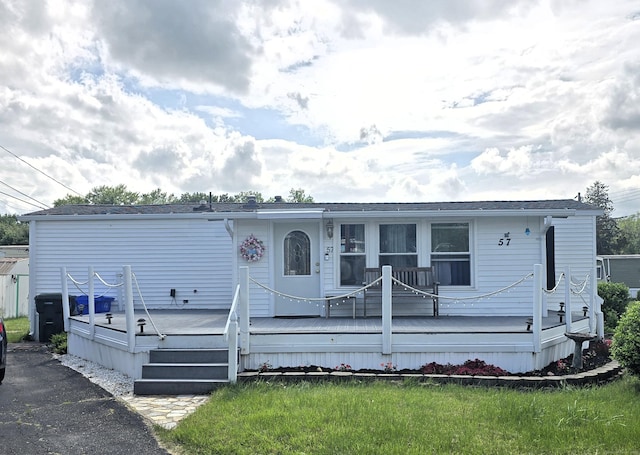 57 Cheyenne Rd, East Hartford, CT 06118 - manufactured / mobile home featuring a wooden deck