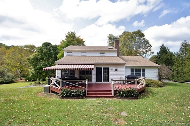 2 Tamshell Dr, Kent, CT 06757 - rear view of property with a wooden deck, a chimney, a yard, and roof with shingles